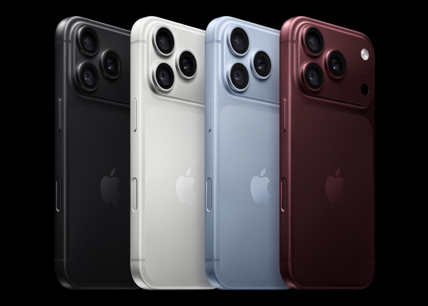Čtyři barevné varianty iPhonu 18 Pro zezadu, černá, stříbrná, ledová a vínová (tisková fotografie Apple)